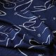 Face on navy jacquard light coating